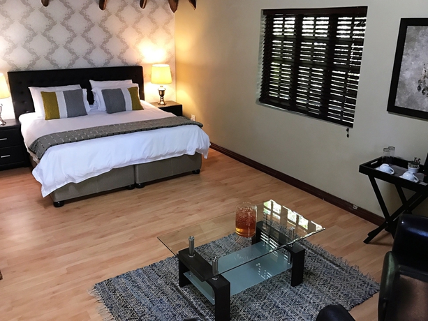 Imagen de la habitación del Hotel The Garden Venue. Foto 5