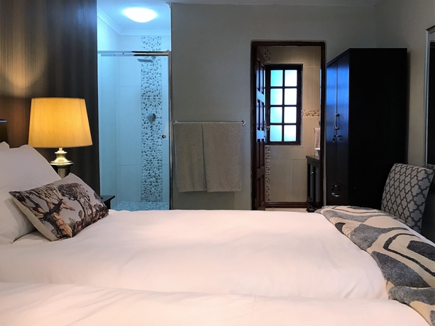 Imagen de la habitación del Hotel The Garden Venue. Foto 6
