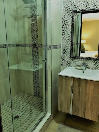 Imagen de la habitación del Hotel The Garden Venue. Foto 11