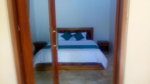 Imagen de la habitación del Hotel The Garden Villa. Foto 8
