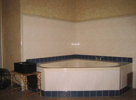 Imagen de la habitación del Hotel The Garden Villas. Foto 6