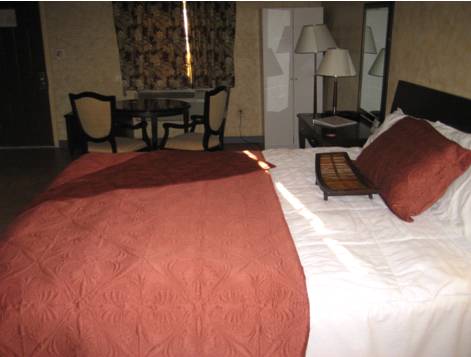 Imagen de la habitación del Hotel The Garden Villas. Foto 8