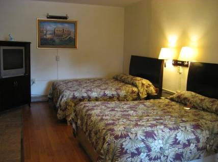 Imagen de la habitación del Hotel The Garden Villas. Foto 13