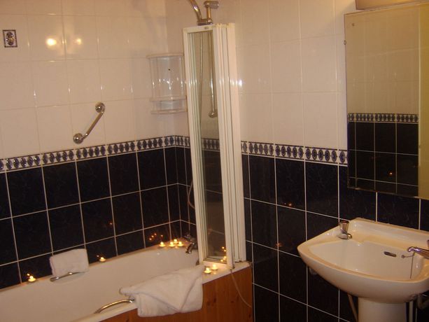 Imagen de la habitación del Hotel The Gardens BandB. Foto 7