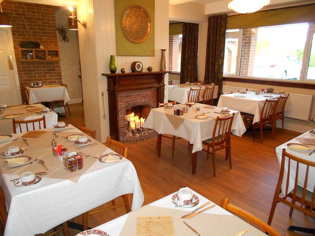 Imagen del bar/restaurante del Hotel The Gardens BandB. Foto 2