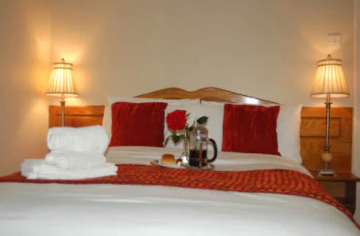 Imagen de la habitación del Hotel The Gardens BandB. Foto 13