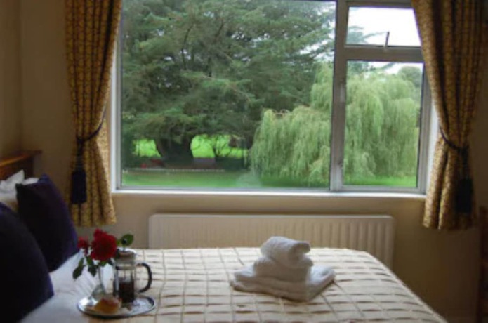 Imagen de la habitación del Hotel The Gardens BandB. Foto 14
