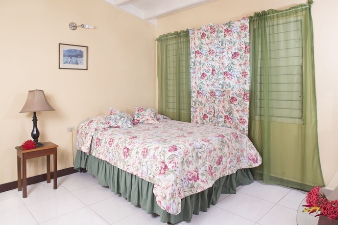 Imagen de la habitación del Hotel The Gardens. Foto 3