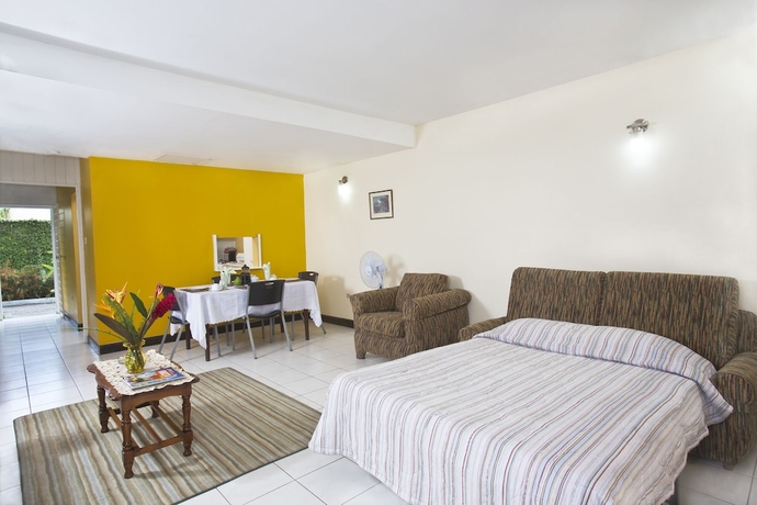 Imagen de la habitación del Hotel The Gardens. Foto 6