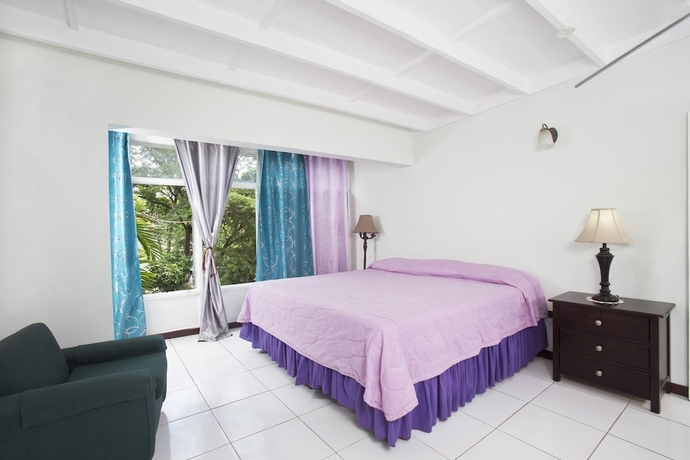 Imagen de la habitación del Hotel The Gardens. Foto 7