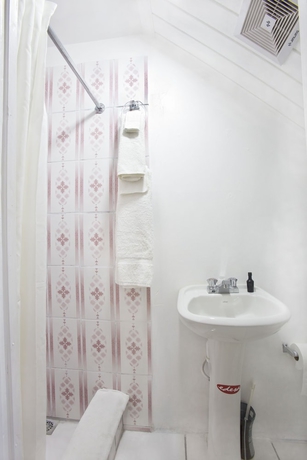 Imagen de la habitación del Hotel The Gardens. Foto 14