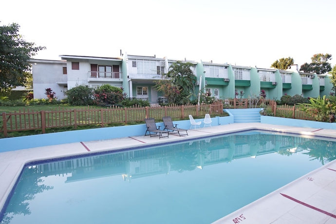 Imagen de la piscina del Hotel The Gardens. Foto 19