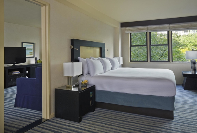 Imagen de la habitación del Hotel The Gardens Sonesta ES Suites New York. Foto 12