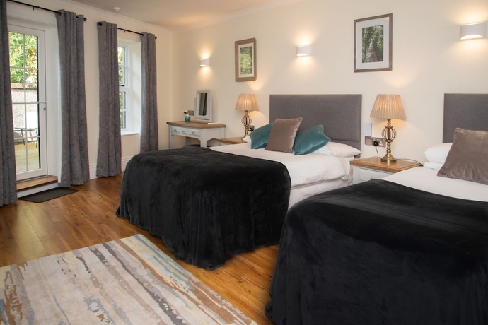 Imagen de la habitación del Hotel The Garrandarragh Inn. Foto 11
