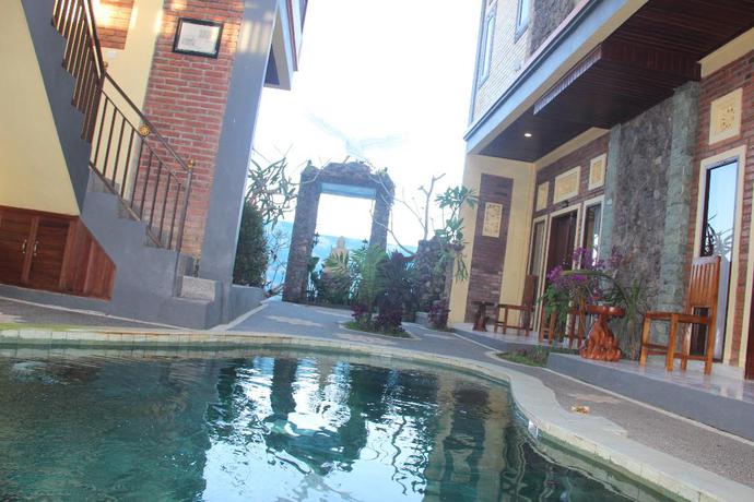 Imagen de la piscina del Hotel The Garuda and Restaurant. Foto 15