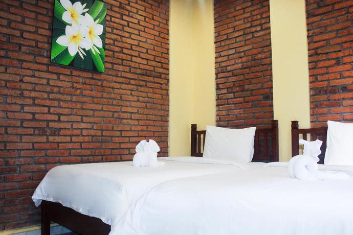 Imagen de la habitación del Hotel The Garuda and Restaurant. Foto 8