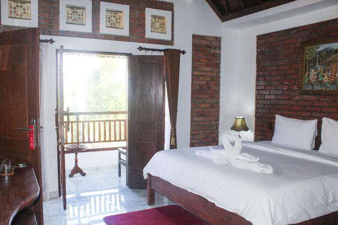 Imagen de la habitación del Hotel The Garuda and Restaurant. Foto 10