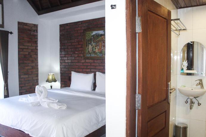 Imagen de la habitación del Hotel The Garuda and Restaurant. Foto 11