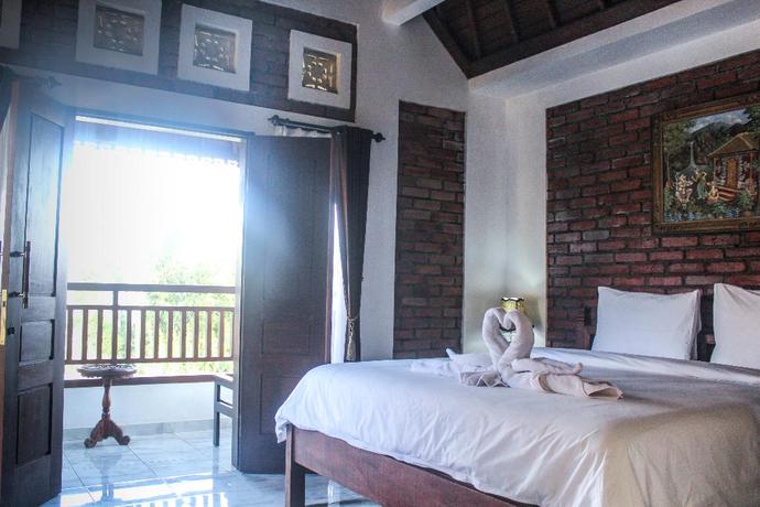 Imagen de la habitación del Hotel The Garuda and Restaurant. Foto 12