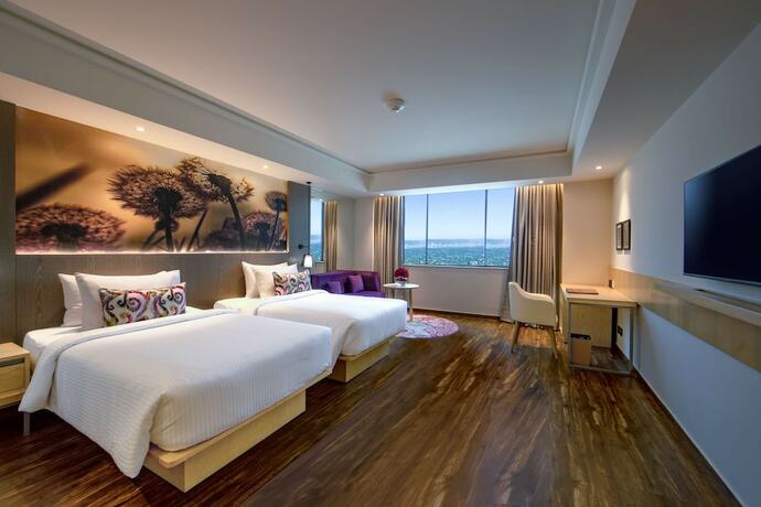 Imagen de la habitación del Hotel The Gaurs Sarovar Premiere. Foto 13