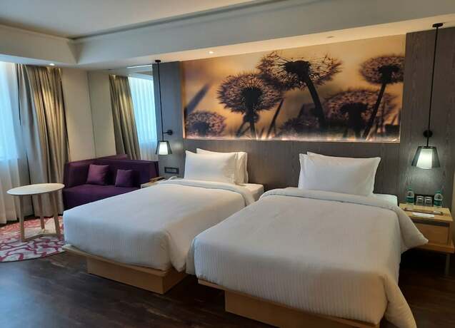 Imagen de la habitación del Hotel The Gaurs Sarovar Premiere. Foto 14