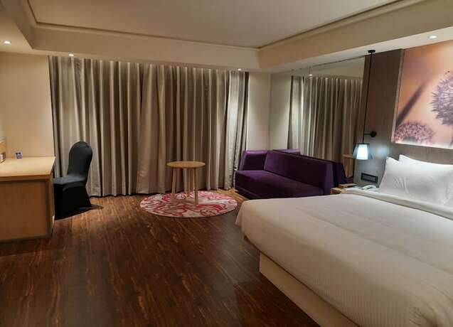 Imagen de la habitación del Hotel The Gaurs Sarovar Premiere. Foto 16