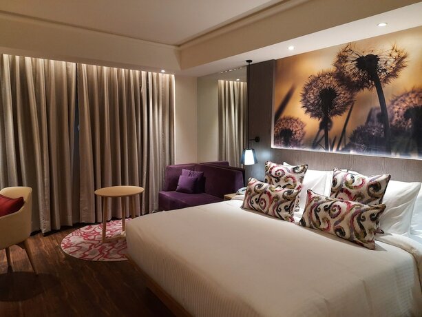 Imagen de la habitación del Hotel The Gaurs Sarovar Premiere. Foto 17