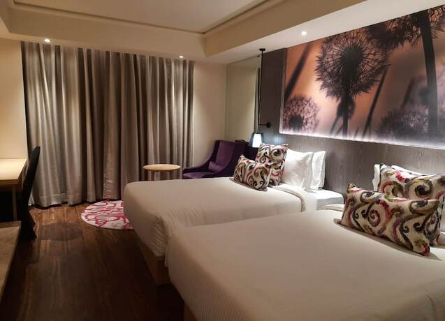 Imagen de la habitación del Hotel The Gaurs Sarovar Premiere. Foto 19
