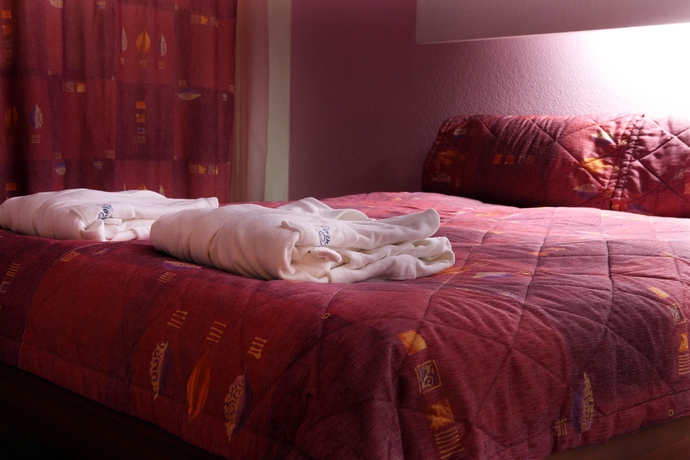 Imagen de la habitación del Hotel The Gavan. Foto 4