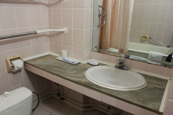 Imagen de la habitación del Hotel The Gavan. Foto 7