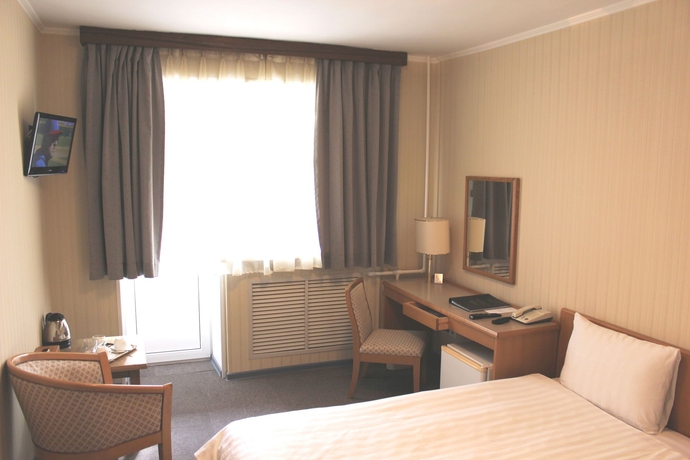 Imagen de la habitación del Hotel The Gavan. Foto 8