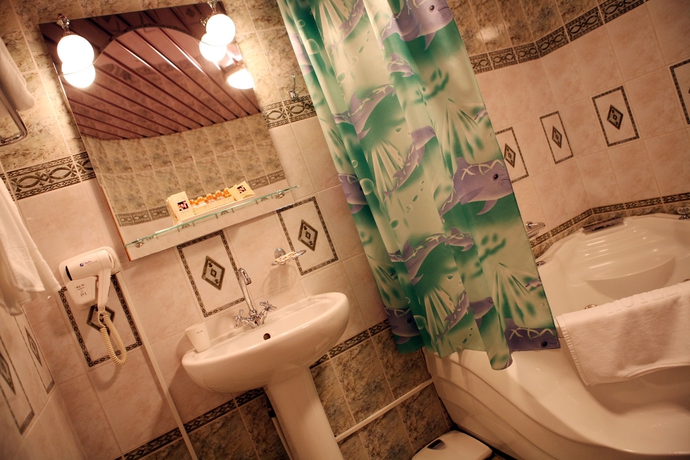 Imagen de la habitación del Hotel The Gavan. Foto 9