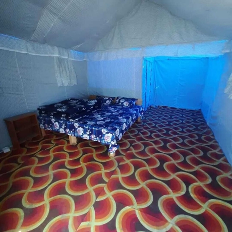 Imagen de la habitación del Hotel The Gazzaar Riverside camp. Foto 11