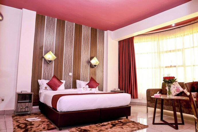 Imagen de la habitación del Hotel The Gem. Foto 18