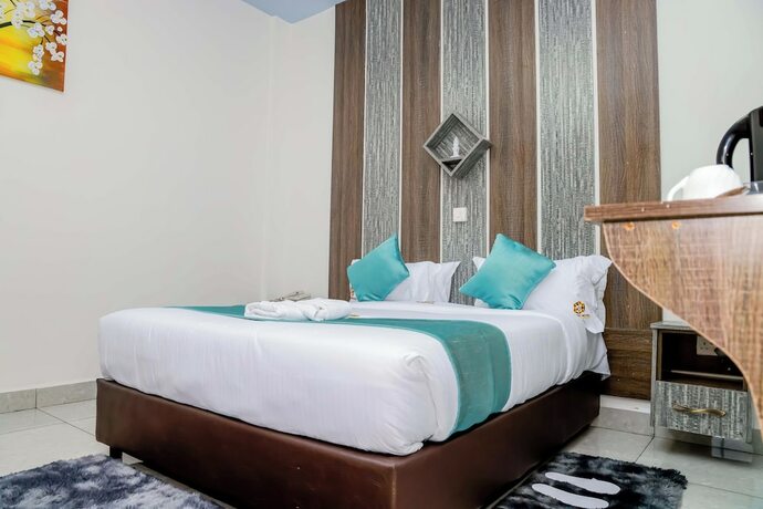 Imagen de la habitación del Hotel The Gem. Foto 19