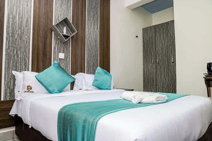 Imagen de la habitación del Hotel The Gem. Foto 20