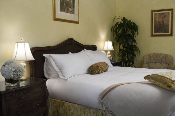 Imagen de la habitación del Hotel The Genevieve. Foto 4