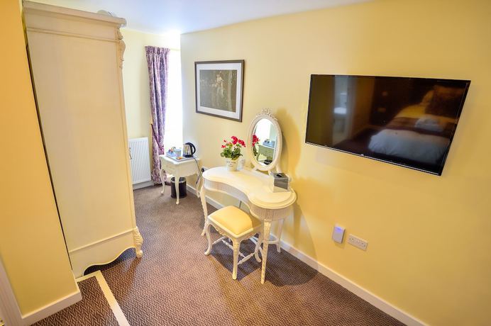 Imagen de la habitación del Hotel The George, Axminster. Foto 8