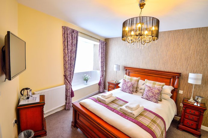 Imagen de la habitación del Hotel The George, Axminster. Foto 17