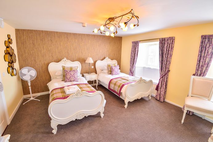 Imagen de la habitación del Hotel The George, Axminster. Foto 19