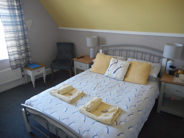 Imagen de la habitación del Hotel The George BandB. Foto 2