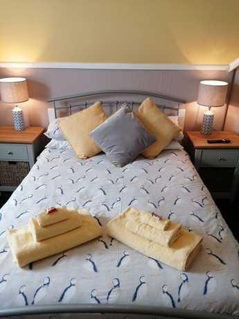 Imagen de la habitación del Hotel The George BandB. Foto 3