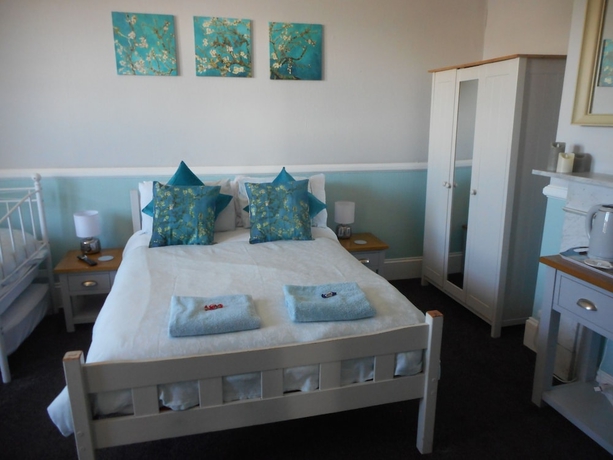 Imagen de la habitación del Hotel The George BandB. Foto 8