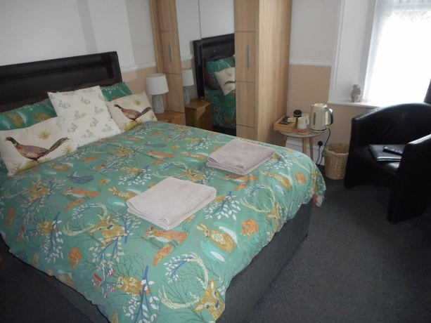 Imagen de la habitación del Hotel The George BandB. Foto 10