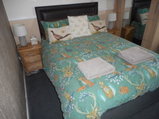 Imagen de la habitación del Hotel The George BandB. Foto 11
