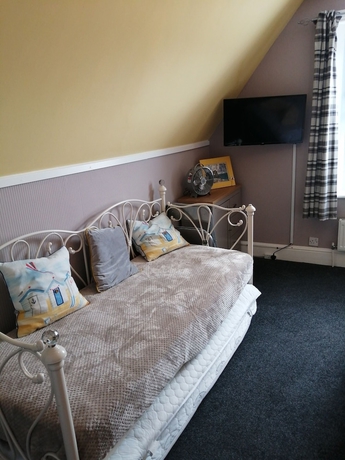 Imagen de la habitación del Hotel The George BandB. Foto 13