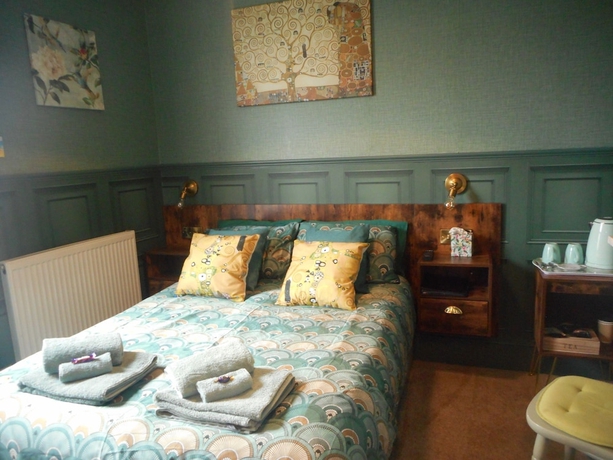 Imagen de la habitación del Hotel The George BandB. Foto 15