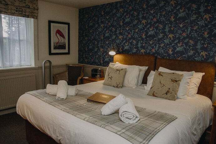 Imagen de la habitación del Hotel The George Inn. Foto 16