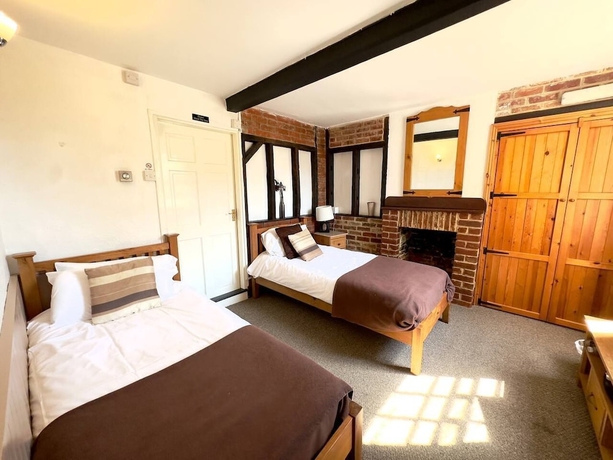 Imagen de la habitación del Hotel The George and Dragon Inn. Foto 7