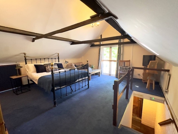 Imagen de la habitación del Hotel The George and Dragon Inn. Foto 12